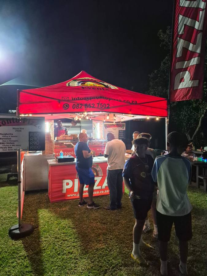 Pronto Pizza serving at a festival