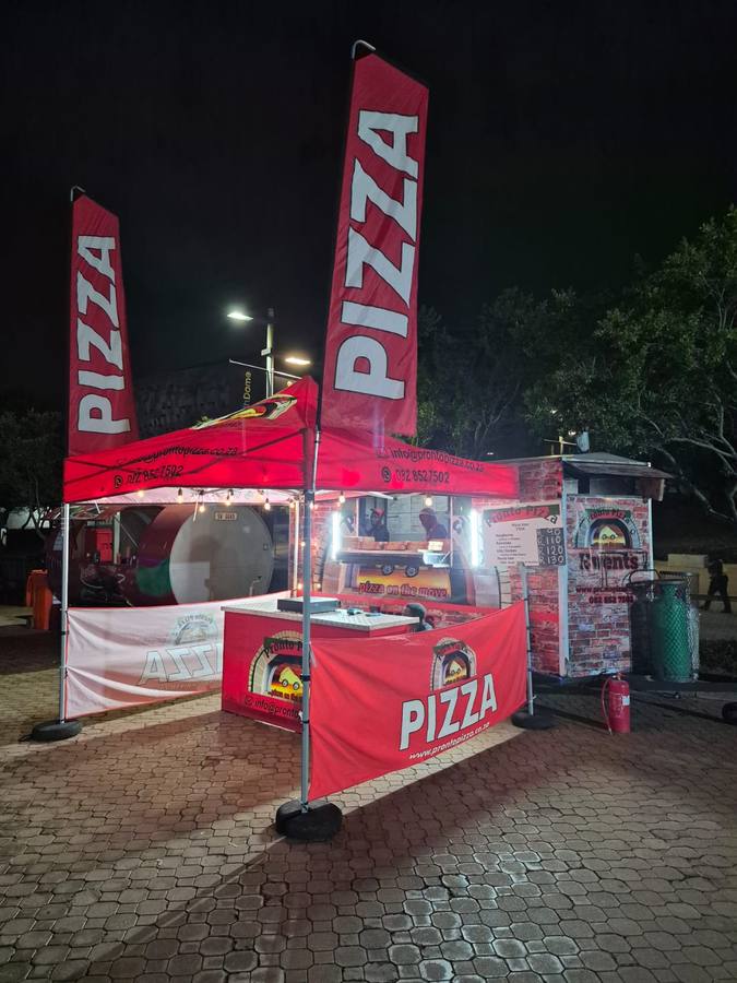 Pronto Pizza serving at a festival