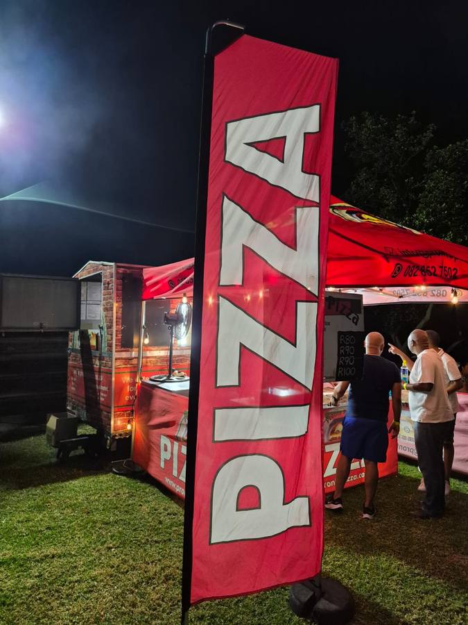 Pronto Pizza serving at a festival