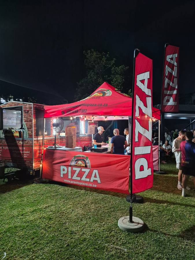 Pronto Pizza serving at a festival