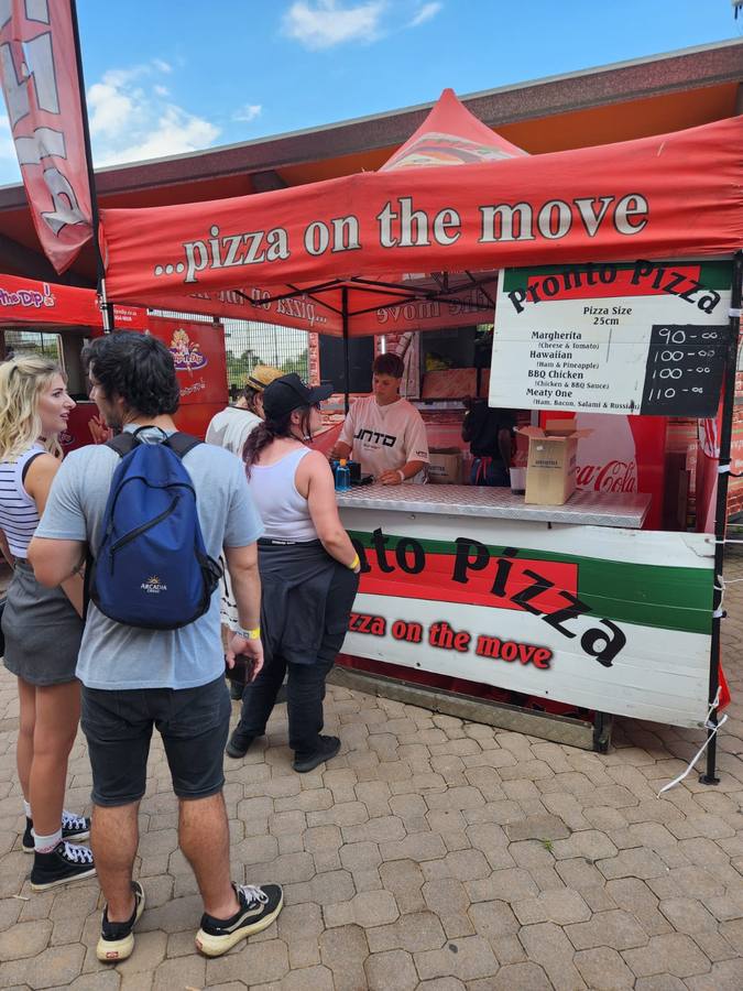 Pronto Pizza serving at a festival