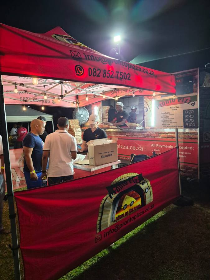 Pronto Pizza serving at a festival