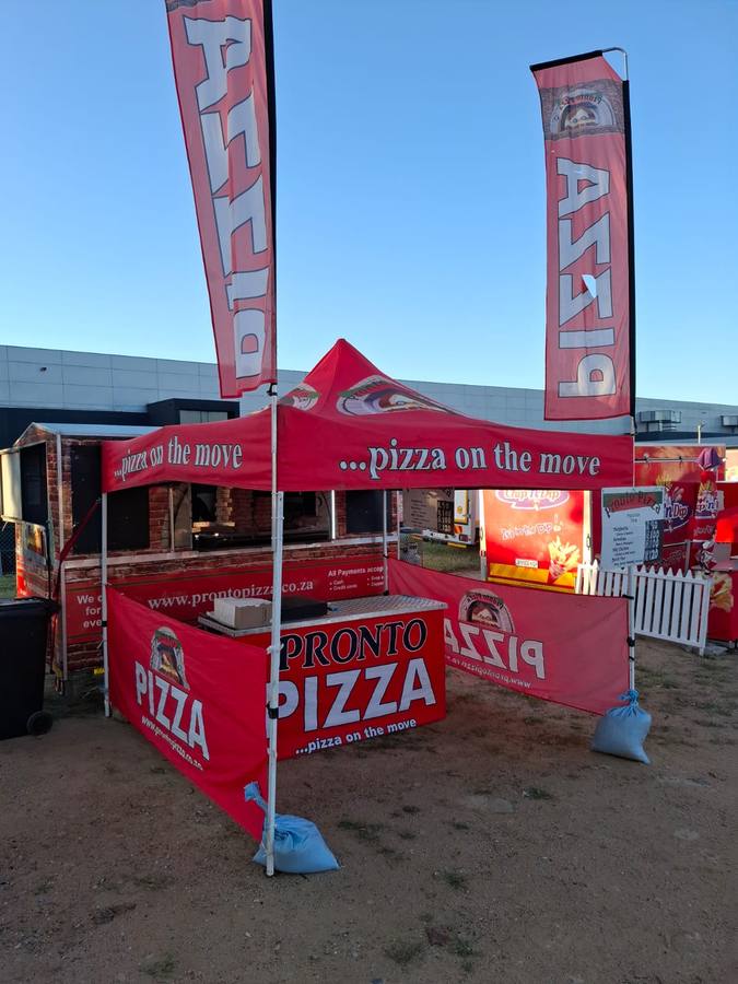 Pronto Pizza serving at a festival