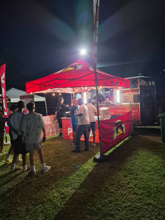 Pronto Pizza serving at a festival